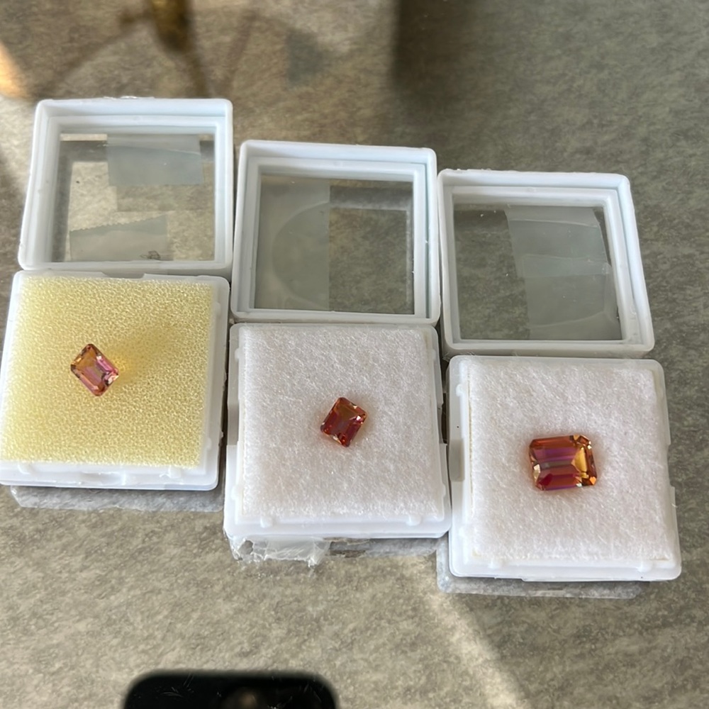 Selling set of three loose gems.